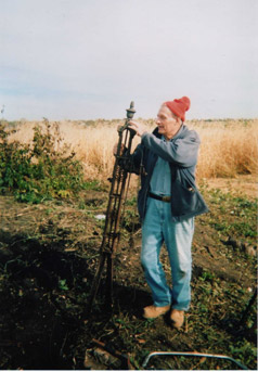 Bill Flynn is shown here with the corner post at the Hollingsworth Cemetery. The Hollingsworth Cemetery is currently being renovated.